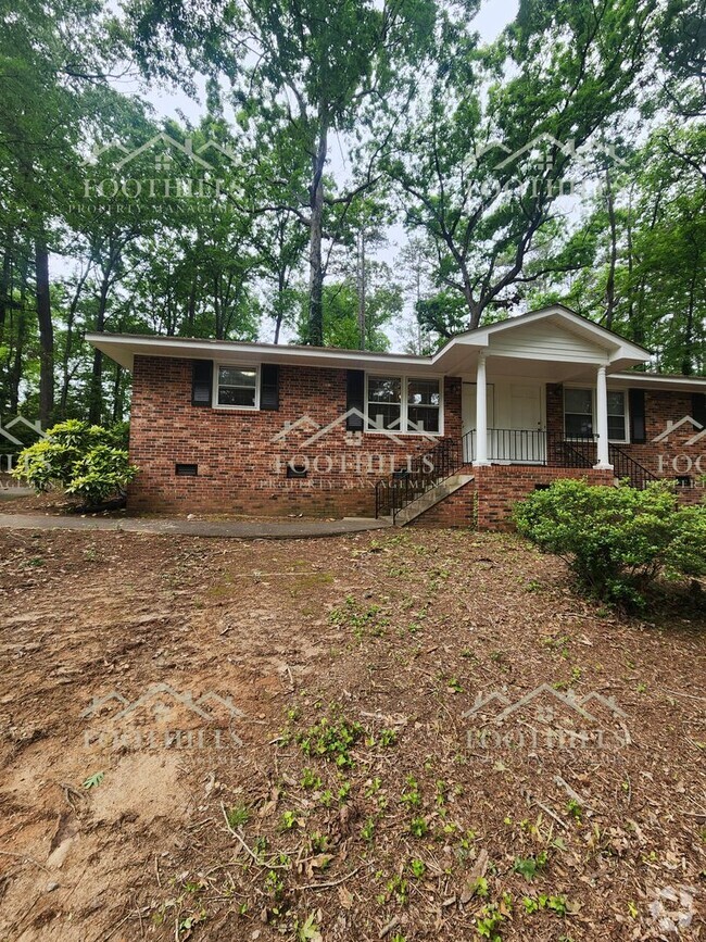 Building Photo - Charming 2-Bed Duplex with Hardwood Floors... Rental