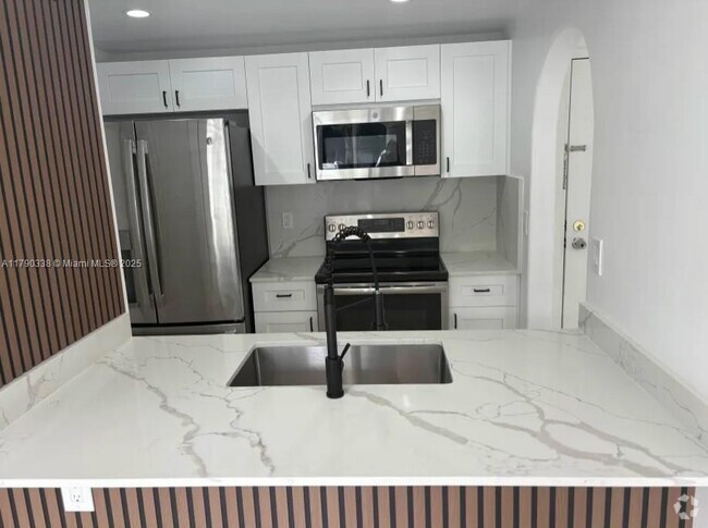 Building Photo - 7165 NW 186th St Unit A111 Rental