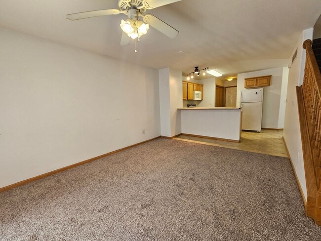 Photo - 2 Bedroom 1.5 bath condo with attached garage in great NE location! Unit A