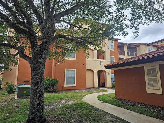 Building Photo - 5506 Metrowest Blvd Unit 13-103