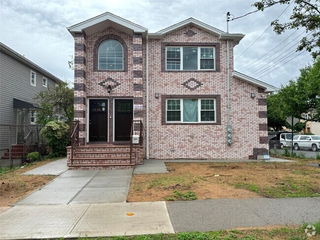Building Photo - 127-19-127143 143rd St Unit 2nd floor Rental