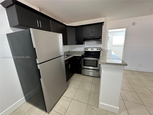 Building Photo - 101 NE 41st St Unit G117