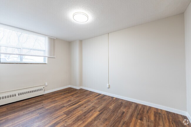 2BR, 1BA - 784SF - Primary Bedroom - 11 Kendale Court Apartments