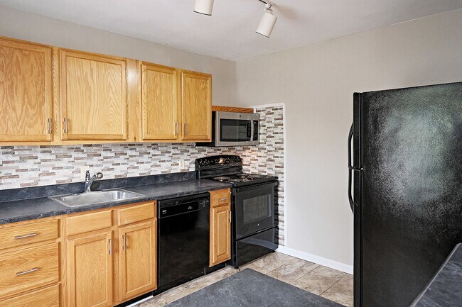 Photo - Dog-Friendly Villas at Southern Ridge Apartment With Community Amenities Unit D