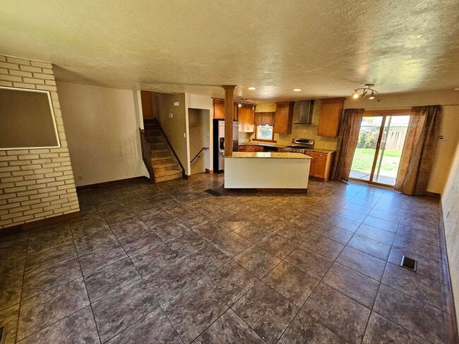 Photo - Charming 3-Bed, 2-Bath Tri-Level Home with Spacious Backyard & Gazebo