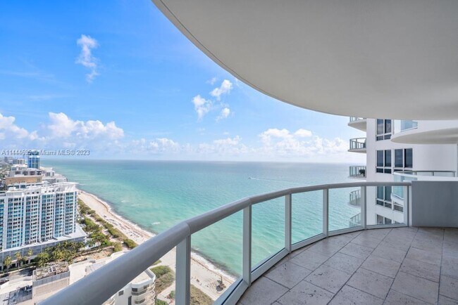 Building Photo - 6365 Collins Ave Rental