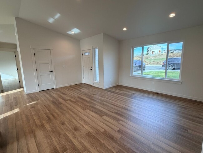 Photo - BRAND NEW construction! 3 beds, 2 baths, double garage, deck with VIEWS and more!