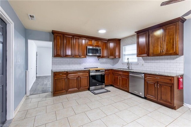 Photo - Welcome to this beautifully maintained 4-bedroom! "ASK ABOUT OUR ZERO DEPOSIT"