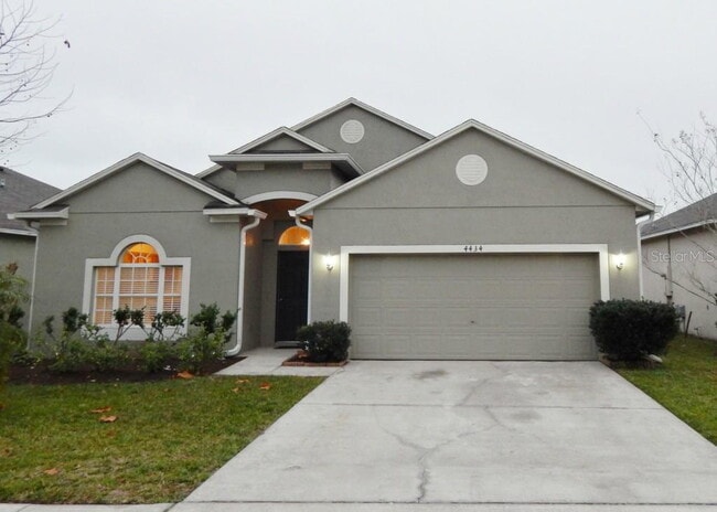 Building Photo - **Charming 4BR/2BA Pond-View Home with Boat Ramp Access – East Orlando **