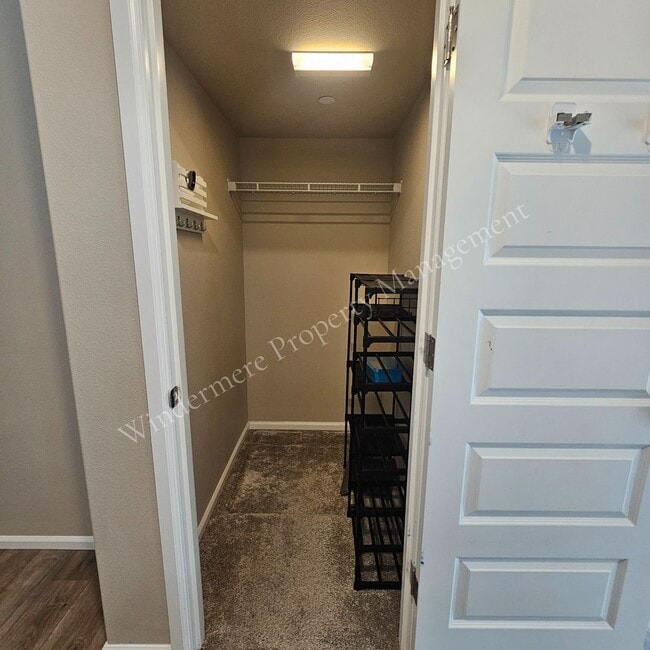 Photo - Spacious 4 Bedroom Home with Gas Fireplace, Office Space & 2-Car Garage!
