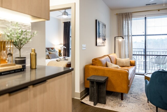 Inviting layout with connected living and bedroom spaces.