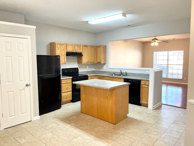 Photo - Welcome to this charming brick townhome in...