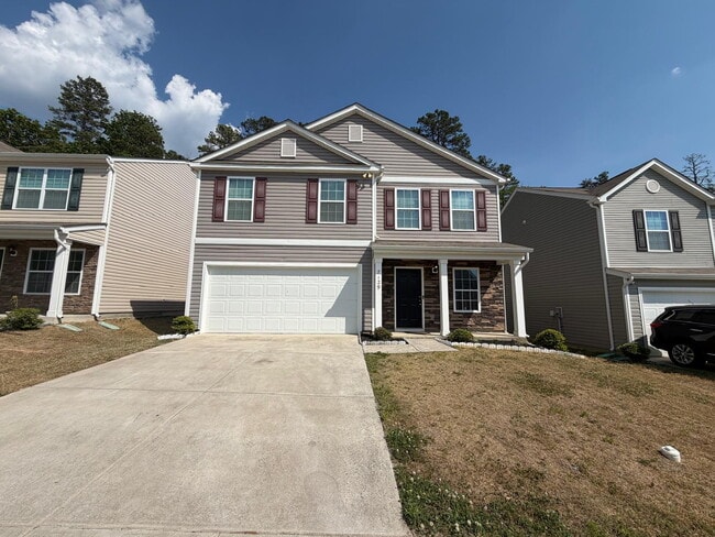 Photo - "Charming 3-Bed Oasis on Finnigan Rd: Spacious 1,994 Sq Ft with Granite Kitchen & Cozy Fireplace!"