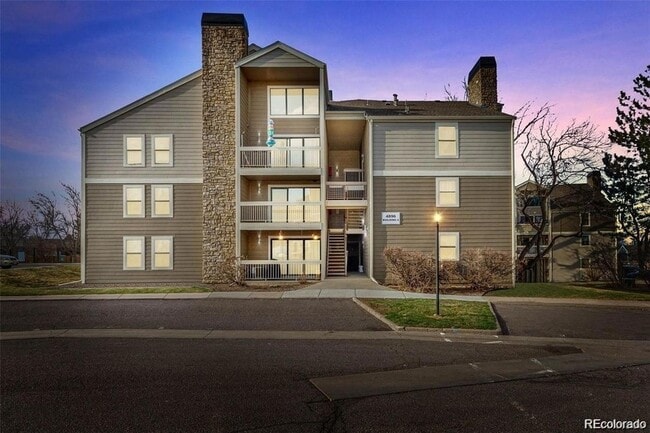 Building Photo - 4896 S Dudley St Unit 6-8