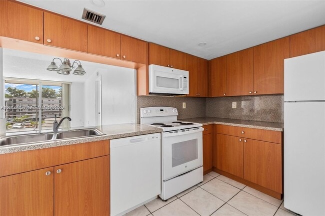 Building Photo - 14185 SW 87th St Unit A-305
