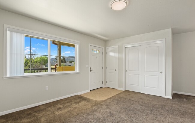 Sunny living room with great storage