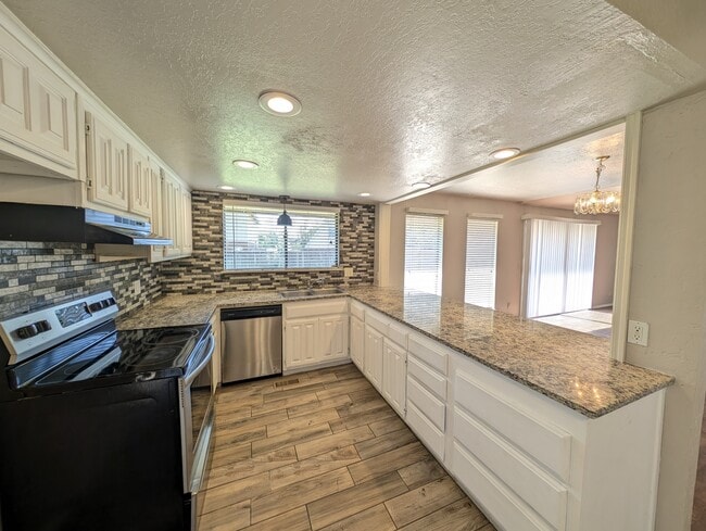 Photo - 8440 E 64th Pl