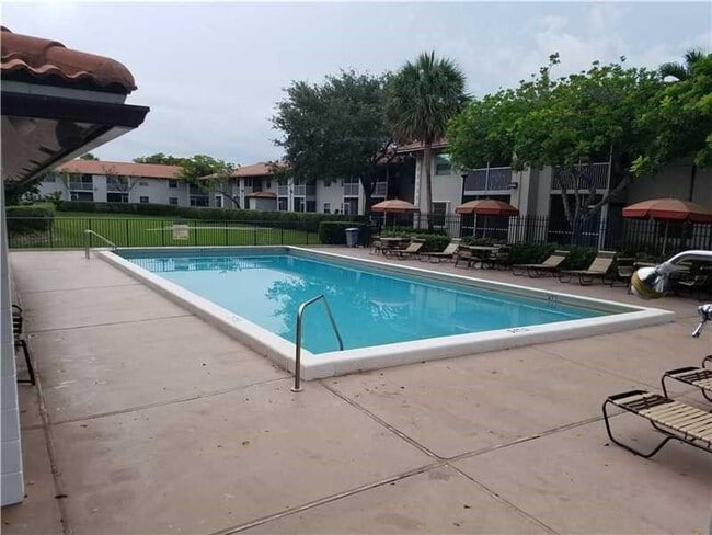 Photo - 8750 Royal Palm Blvd Unit 106