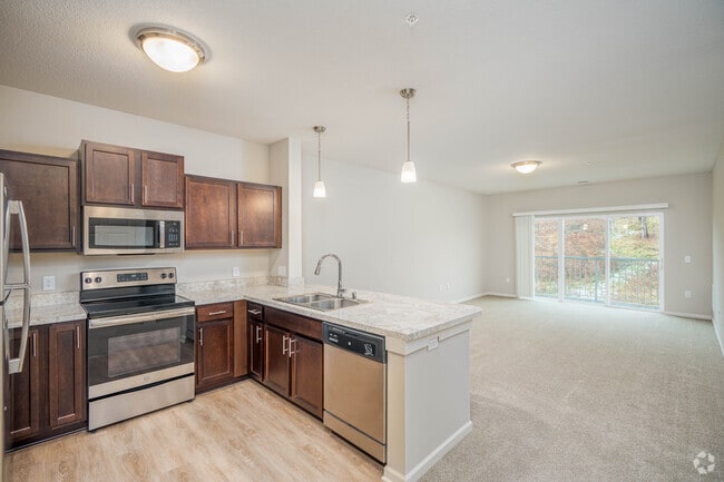 1BR,1BA - 849SF - Kitchen and Living Room