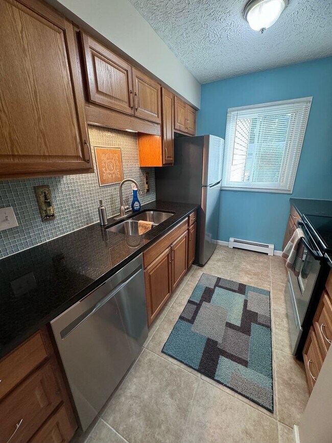 Photo - 3 BEDROOM CONDO WITH A 1 CAR GARAGE AND INCLUDES UTILITIES!