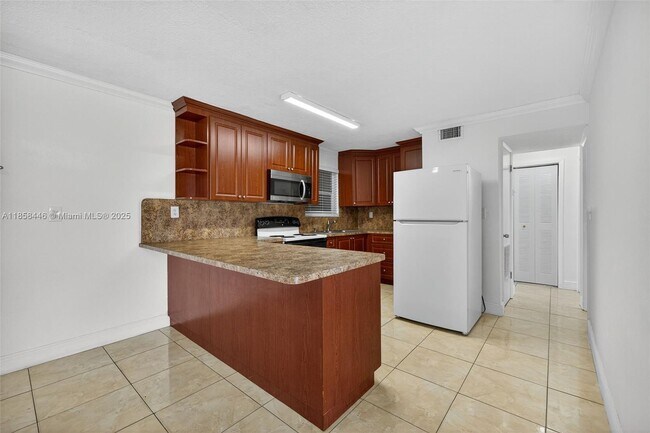 Building Photo - 3501 W 11th Ave Unit 208 Rental