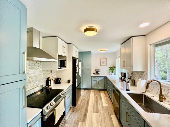 Photo - Spacious 5 Bed 3 Bath Home with In-Law Suite and huge yard in Olympic Hills