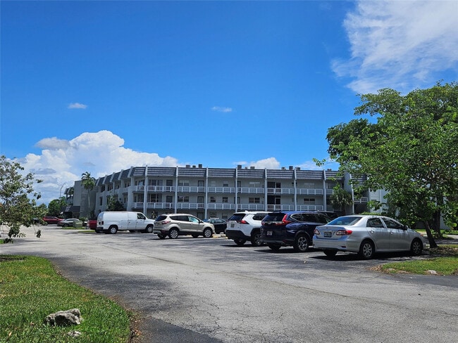 Building Photo - 6650 Royal Palm Blvd Unit 315C