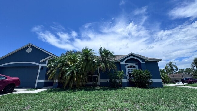 Building Photo - Spacious 4-Bedroom Home in NW Palm Bay – A...