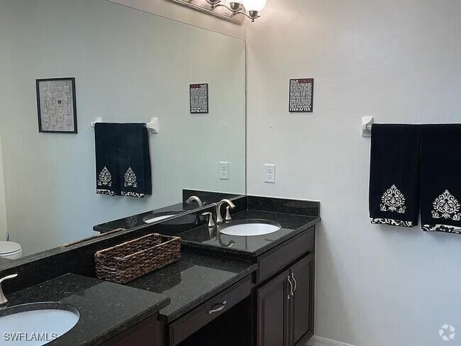 Building Photo - 8570 Evernia Ct Unit 203 Rental