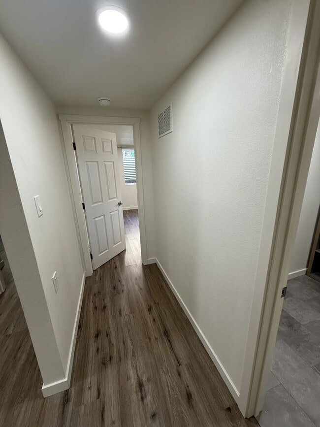 Photo - Newly Renovated Basement Unit with Private Fully Fenced Back Yard and Exclusive Parking Area