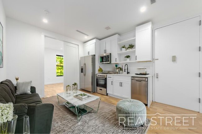 Brand New 3 Bed 2 Bath with W/D & Terrace! - Brand New 3 Bed 2 Bath with W/D & Terrace! Apartment Unit 2