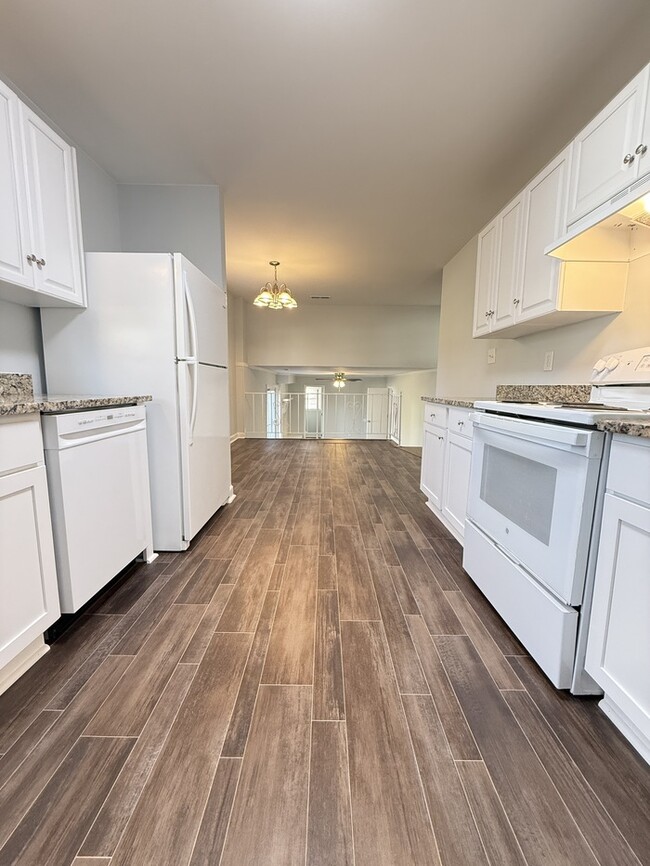 Building Photo - BIG House & BIG Fenced Yard. Plus Master Suite, Den, Shed, and More!