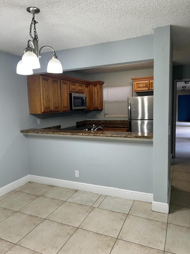 Photo - 1581 Windorah Way Unit A