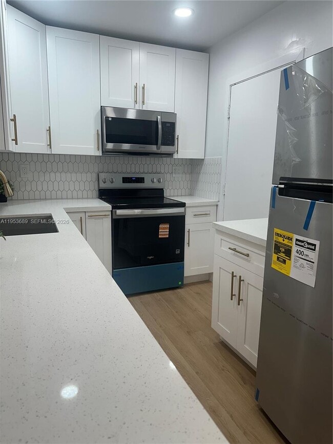 Building Photo - 9175 SW 77th Ave Unit 304