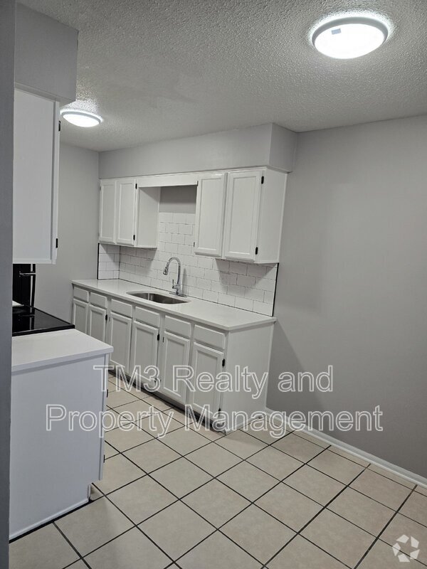 Building Photo - 1602 E Kansas City Rd Unit 6 Rental