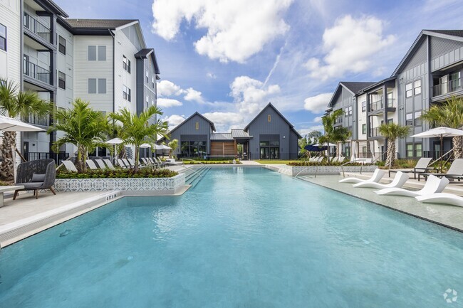 Poolside lounging at Azalea Luxury Apartments in Tampa, Florida - Azalea Luxury Apartments