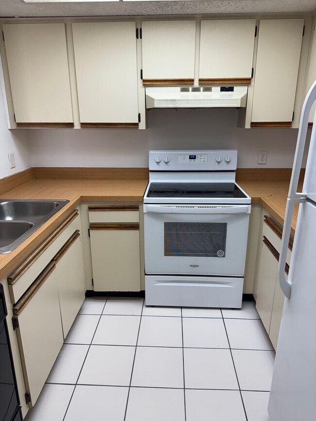 Photo - Centrally located condo in great community Unit E-205