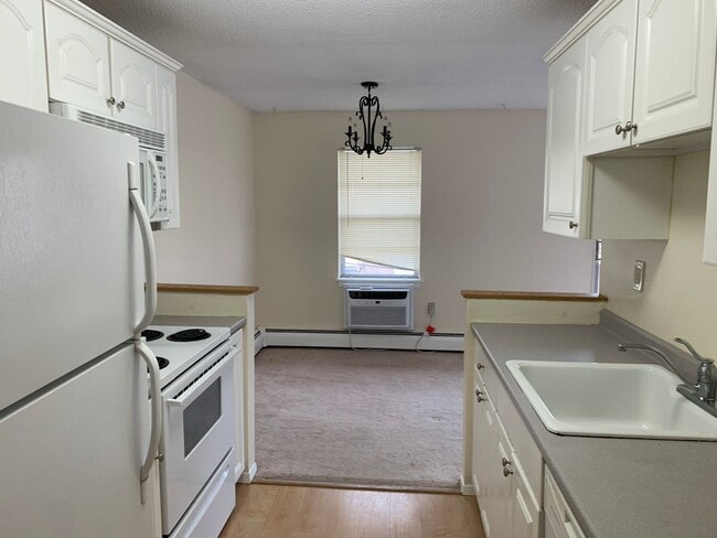 Photo - Upper Level Unit With Heat and Hot Water I...