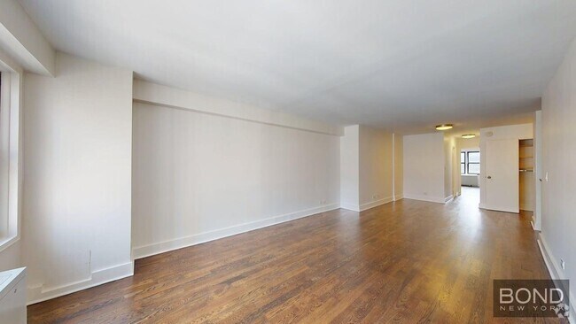 Building Photo - 220 E 63rd St Unit 11K Rental