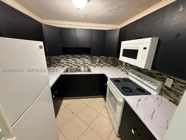 Photo - 1055 W 77th St Unit 309