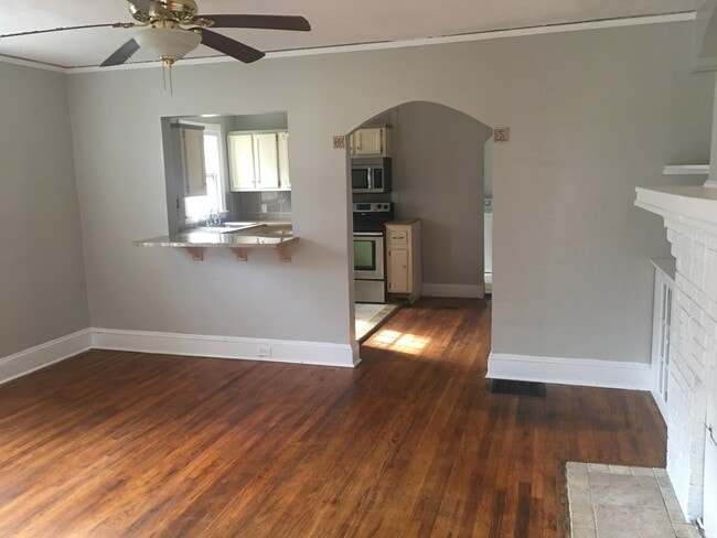 View from living room to kitchen. - 728 Pearce Street Southwest