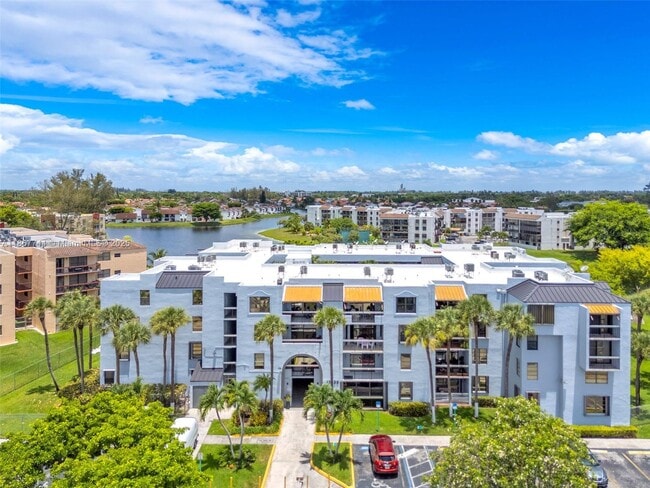 Building Photo - 12239 SW 14th Ln Unit 3212 Rental