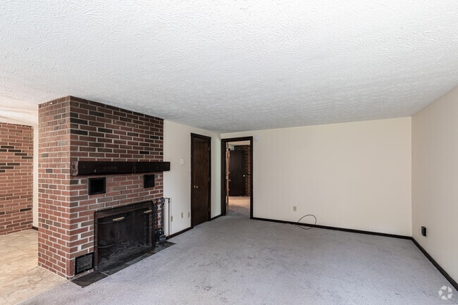 1BR, 1BA With Fireplace - Living Room - Meadowbrook Apartments