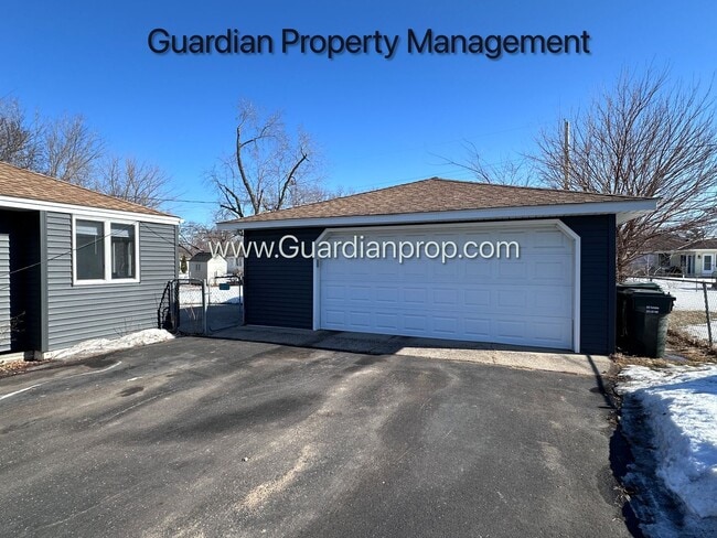 Photo - Single Family Home Featuring 2 Baths, 2 Car Garage, Fireplace, and Fenced in Yard