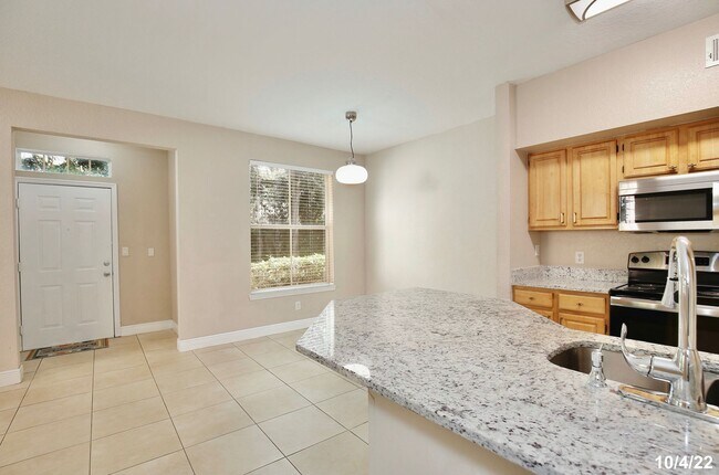 Photo - Beautiful 3/2 Spacious Condo with Lawn Car...