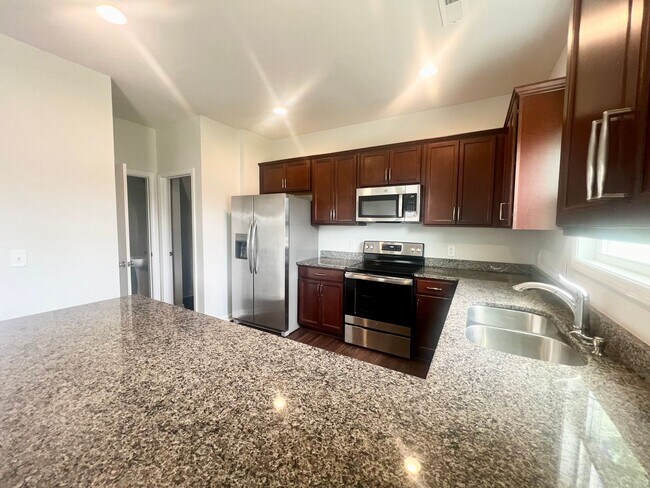 Photo - Welcome Home! 4BR/2.5BA in Manning Crossing – Elon