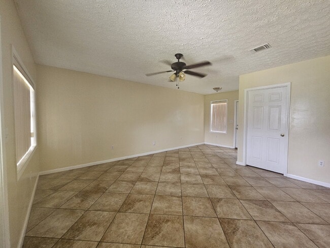 Photo - "Charming 3-Bedroom Retreat with Spacious Living"