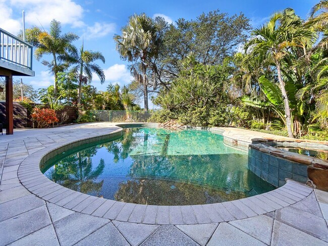 Photo - 4 Bed Waterfront Paradise with Pool, Dock & Gulf Access in Baileys Bluff