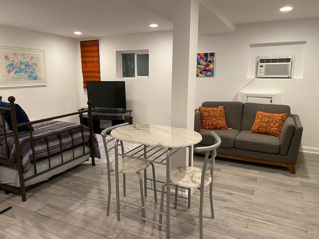 Living room area - 4506 Iowa Ave NW Unit 1