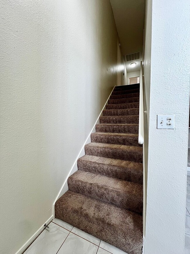 Photo - TWO BEDROOM TOWNHOME WITH VAULTED CEILING AND GRAND FRONT WINDOWS